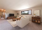 Thumbnail 1 of 6 - Spacious Living Room at Parkview Arms Apartments in Bismarck, ND