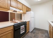 Thumbnail 4 of 7 - Bismarck, ND Bradbury Apartments. this is a photo of the kitchen in a 1 bedroom apartment