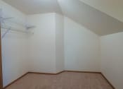 Thumbnail 17 of 26 - a closet with a shelf. Fargo, ND Bridgeport Apartments