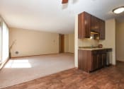 Thumbnail 7 of 30 - The Edge of Uptown Apartments | Kitchen & Living Room