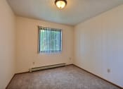 Thumbnail 6 of 10 - the living room with a window. Fargo, ND Chestnut Ridge Apartments