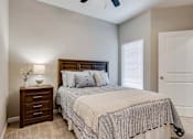 Thumbnail 66 of 83 - a bedroom with a bed and a closet. Circle Pines, MN Lexington Lofts