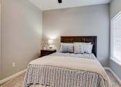 Thumbnail 65 of 83 - a bedroom with a bed and a window. Circle Pines, MN Lexington Lofts