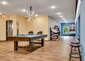 Thumbnail 75 of 83 - a game room with a pool table. Circle Pines, MN Lexington Lofts
