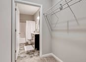 Thumbnail 39 of 83 - a bathroom with a shower and a sink and a toilet. Circle Pines, MN Lexington Lofts
