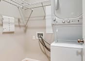 Thumbnail 30 of 83 - the laundry room has a washer and dryer and a dryer in it. Circle Pines, MN Lexington Lofts