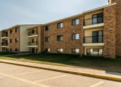 Thumbnail 10 of 10 - Grand Forks, ND Columbia West Apartments. Exterior of a three story apartment building