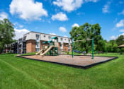 Thumbnail 12 of 14 - our apartments have a playground for your kids to play. Coon Rapids, MN Robinwood Apartments