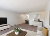 Thumbnail 2 of 14 - a living room with a couch and a coffee table.Coon Rapids, MN Robinwood Apartments