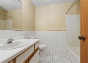 Thumbnail 25 of 29 - a bathroom with a sink toilet and a bath tub. Anoka, MN Dellwood Estates