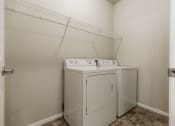 Thumbnail 8 of 11 - Diamond Bend Apartments | Laundry Room