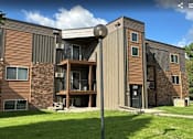 Thumbnail 15 of 17 - A modern apartment building with a balcony. Grand Forks, ND Cedarwood Apartments