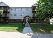 Thumbnail 7 of 7 - Fargo, ND Ashbury Apartments. Exterior of the front door