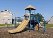 Thumbnail 4 of 4 - a playground with a slide and a tower. Fargo, ND Bluestem Townhomes