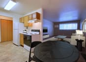Thumbnail 2 of 10 - Fargo, ND Dakota Manor Apartments. a kitchen and dining area in a 555 waverly unit