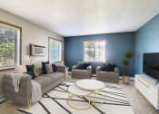 Thumbnail 2 of 19 - Fargo, ND Foxboro Townhomes. a living room with couches and a coffee table
