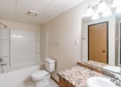Thumbnail 22 of 25 - a bathroom with a sink and a toilet and a shower at France, Fargo, ND 58103   at France, Fargo, ND