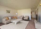 Thumbnail 1 of 14 - a living room with a couch and chairs and a coffee table. Fargo, ND Hazelwood Townhomes