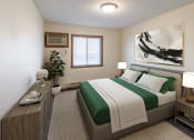 Thumbnail 3 of 49 - Fargo, ND Lake Crest Apartments. A bedroom with a large painting on the wall and a bed with a green blanket