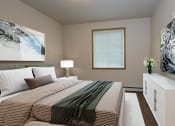 Thumbnail 3 of 25 - a bedroom with a large bed and a window. Fargo, ND North Sky Apartments
