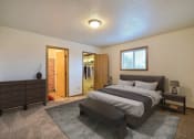 Thumbnail 3 of 23 - Bed and a dresser at Parkwest Gardens West Fargo, ND 58078