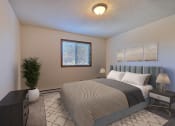 Thumbnail 6 of 36 - a bedroom with a bed and a plant and a window