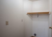 Thumbnail 28 of 32 - a bathroom with a shower and a hanging rail on the wall