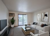 Thumbnail 3 of 32 - a living room with a white couch and a television. Fargo, ND Prairie Park Apartments
