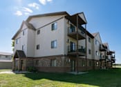 Thumbnail 19 of 19 - Fargo, ND Rosegate Apartments. an exterior view of an apartment building