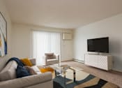 Thumbnail 4 of 16 - Fargo, ND Twin Parks Apartments. this is a photo of the living room in a 1 bedroom apartment at deer hill apartments in