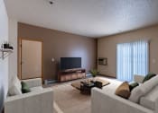 Thumbnail 6 of 61 - a living room with a couch and a tv. Fargo, ND West Lake Apartments