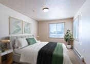Thumbnail 7 of 61 - a bedroom with a king sized bed. Fargo, ND West Lake Apartments