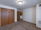 Thumbnail 10 of 24 - a bedroom with a closet. Fargo, ND Willow Park Apartments