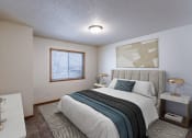 Thumbnail 3 of 24 - a bedroom with a bed and a window. Fargo, ND Willow Park Apartments