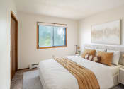 Thumbnail 3 of 13 - a bedroom with a large bed and a window. Fargo, ND Brookfield Apartments
