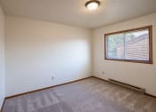 Thumbnail 10 of 13 - a bedroom with a large window and carpeting