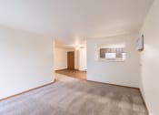Thumbnail 20 of 31 - the living room and dining room of an apartment. Fargo, ND Oxford Apartments