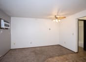 Thumbnail 24 of 28 - the living room of an empty apartment with a ceiling fan. Fargo, ND Pacific Park 2