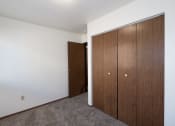 Thumbnail 13 of 28 - a bedroom with a closet. Fargo, ND Pacific Park 2