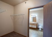 Thumbnail 36 of 61 - an empty bathroom with a shower and a toilet. Fargo, ND West Lake Apartments