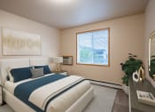 Thumbnail 3 of 61 - a bedroom with a bed and a window. Fargo, ND West Lake Apartments