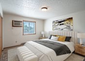 Thumbnail 3 of 25 - the master bedroom has a king sized bed and a large window