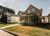 Thumbnail 1 of 7 - Grand Forks, ND Faul 4 Plex. Exterior of a two story house