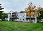Thumbnail 22 of 23 - An exterior of a three level apartment. Fargo, ND Flagstone Apartments.