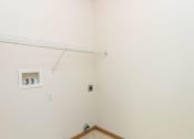 Thumbnail 14 of 15 - a white bathroom with a shelf on the wall. Fargo, ND Foxtail Townhomes