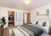 Thumbnail 3 of 15 - a bedroom with a bed and a closet. Fargo, ND Foxtail Creek Townhomes