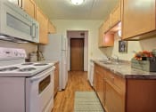 Thumbnail 7 of 25 - a kitchen with white appliances  at France, North Dakota, 58103