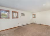 Thumbnail 13 of 19 - a bedroom with carpet and two windows.  Golden Valley, MN Valley View Apartments