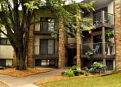 Thumbnail 11 of 11 - White Bear Lake, MN White Bear Terrace Apartments.  an apartment building with a large tree in front of it