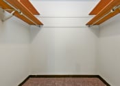 Thumbnail 6 of 11 - White Bear Lake, MN White Bear Terrace Apartments.  a walk in closet with shelves for storage